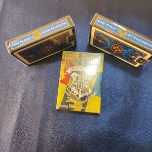Hogwarts Unopened deck of playing cards and an additional 2 dragonback card sets